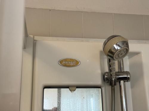 a bathroom door with a door knob and a door at Ottocento - Casa Brunori in Follonica