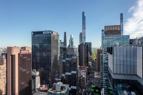 a view of a city skyline with tall buildings at Tempo By Hilton New York Times Square in New York