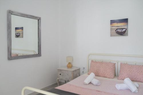 Ένα ή περισσότερα κρεβάτια σε δωμάτιο στο Kyklades Sensation Apartments ATH Airport