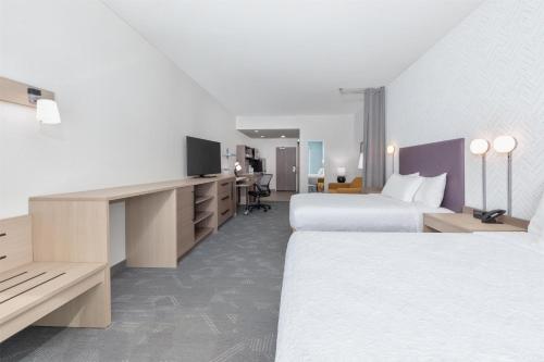 Postel nebo postele na pokoji v ubytování Home2 Suites By Hilton Paris