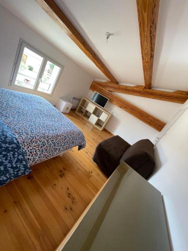 Postel nebo postele na pokoji v ubytování Villa vigneronne moderne piscine et jaccuzi