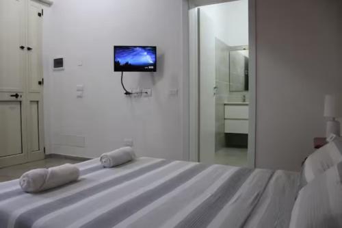 Postel nebo postele na pokoji v ubytování Lodgings in Sardinia
