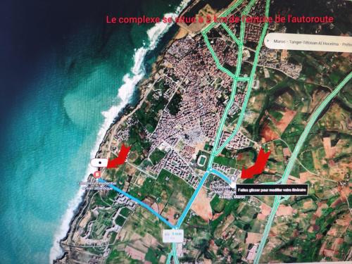 a map of a beach with red arrows at Atlantique Assilah Locations de Vacances in Asilah