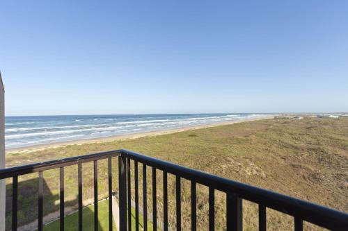 a view of the beach from the balcony of a condo at Sea Vista in South Padre Island