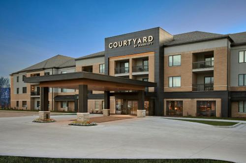 a building with a sign that reads court yard market at Courtyard Wausau in Wausau