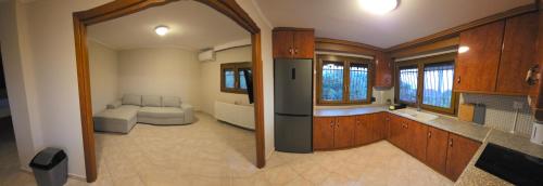 Η κουζίνα ή μικρή κουζίνα στο Aegean Breeze House