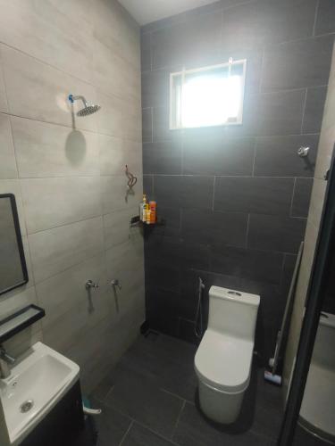 Koupelna v ubytování MYRA Homestay Jalan Pasir Mas-Salor