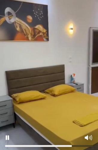Una cama o camas en una habitación de Tinou RDC