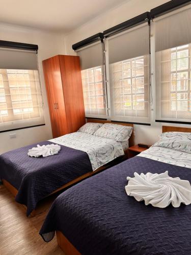 Postel nebo postele na pokoji v ubytování Casa Hotel Palermo 49