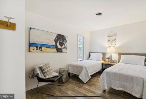 Ένα ή περισσότερα κρεβάτια σε δωμάτιο στο Beautiful Sea Colony Condo For 4