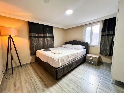 Postel nebo postele na pokoji v ubytování Müstakil Alt Kat Havuzlu Villa