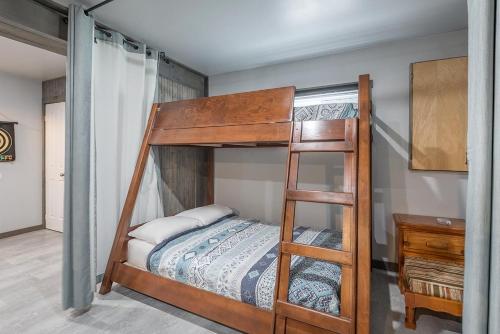 Ένα ή περισσότερα κρεβάτια σε δωμάτιο στο Chalet Wapiti