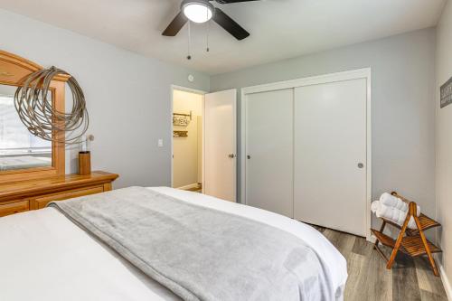 a bedroom with a bed and a ceiling fan at Peaceful Forest Views and Patio Twain Harte Home in Twain Harte