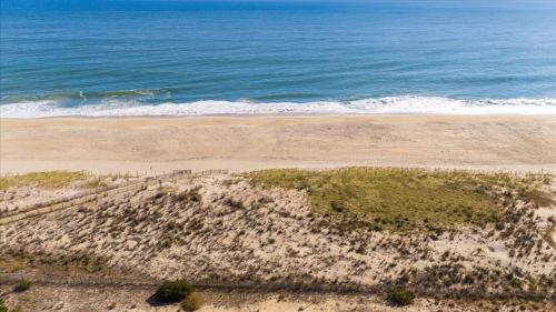 an aerial view of a beach with the ocean at Ocean View 3BR Condo with Pool in North Ocean City in Ocean City