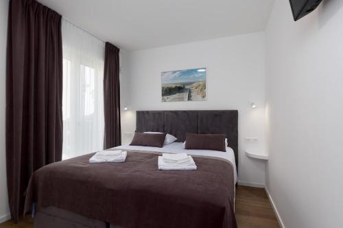 Apartments with parking space Porec - 24365