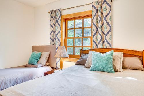 a bedroom with two beds and a window at Salmon Return and Wildlife Roam Ketchikan Getaway! in Ketchikan