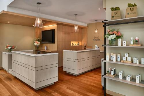 a salon with a counter in a room at The Highland Dallas, Curio Collection by Hilton in Dallas
