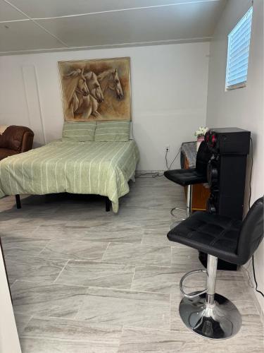 Ένα ή περισσότερα κρεβάτια σε δωμάτιο στο La casita de Elegua