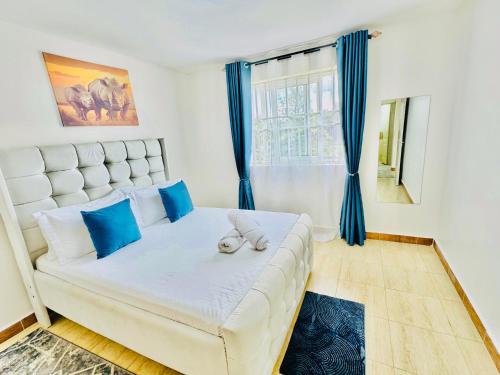 Postel nebo postele na pokoji v ubytování Serene Escapade