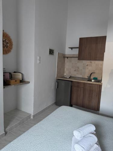 Postel nebo postele na pokoji v ubytování Fedra Apartments Lindos