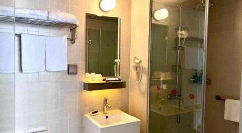 Ένα μπάνιο στο Jinjiang Inn Select Xuzhou Suining Middle Yuanfu Road