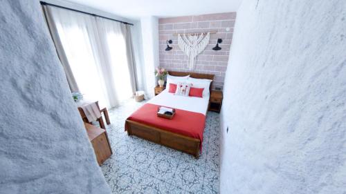 Ένα ή περισσότερα κρεβάτια σε δωμάτιο στο Q-Zen House Cunda