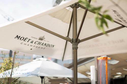 a white umbrella on a table in a store at Hotel Wing International Select Hakata-Ekimae in Fukuoka