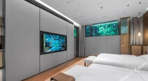 TV o dispositivi per l'intrattenimento presso Hongzhushan Hotel Mount Emei