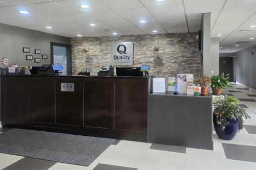 an office lobby with a reception desk and a cash register at Quality Inn Dublin I-81 in Dublin