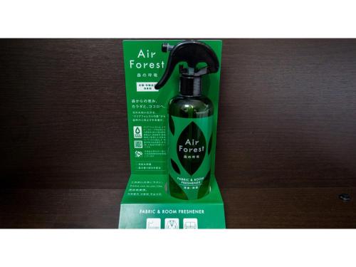 a bottle of air freshener sitting on a box at Smile Hotel Kumamoto Suizenji - Vacation STAY 73098v in Kumamoto
