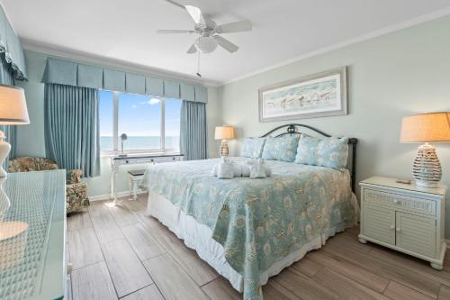 Katil atau katil-katil dalam bilik di Oceanfront Delight by myBeach Vacation Rentals