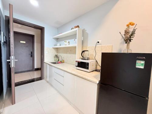 Η κουζίνα ή μικρή κουζίνα στο Saigon Home Apartment - Infinity Pool