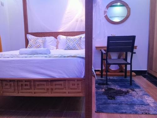 Postel nebo postele na pokoji v ubytování Jabril homes