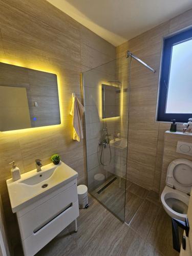 Koupelna v ubytování La Vida Apartments