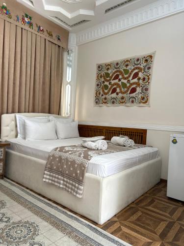 Ένα ή περισσότερα κρεβάτια σε δωμάτιο στο Hotel OROM with real discoun,t