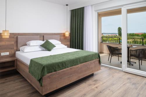 Postel nebo postele na pokoji v ubytování B&B Villa Perla