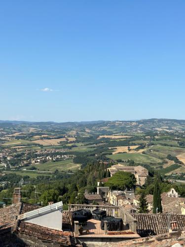 a view of a city from the top of a building at Nido di Gufi in Todi