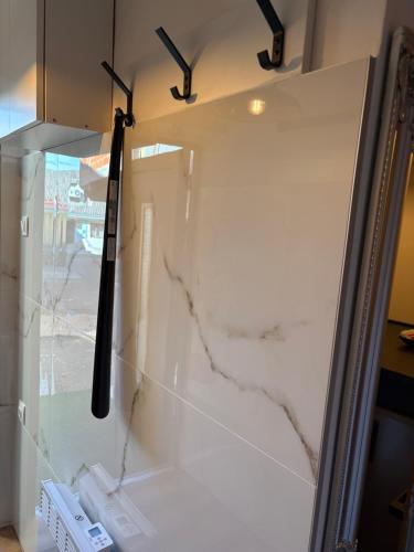 a glass door with a knife on top of it at Captain's house in Karlovac