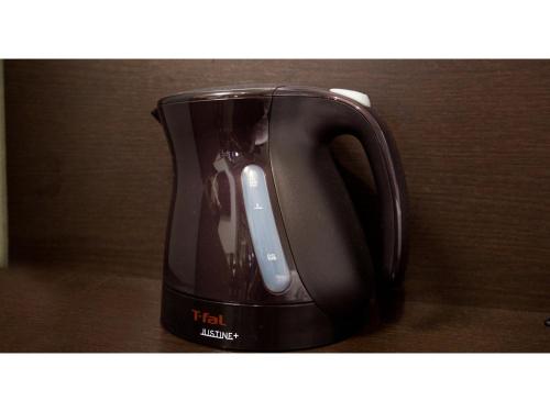 a black coffee cup with aperature at Smile Hotel Kumamoto Suizenji - Vacation STAY 73106v in Kumamoto