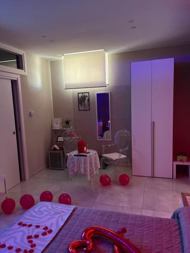 a living room with a room with a table and a large room at Terraforte Luxury Suite in Fisciano