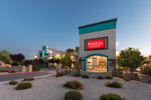 a building with a sign that reads ramagency at Ramada by Wyndham El Paso in El Paso
