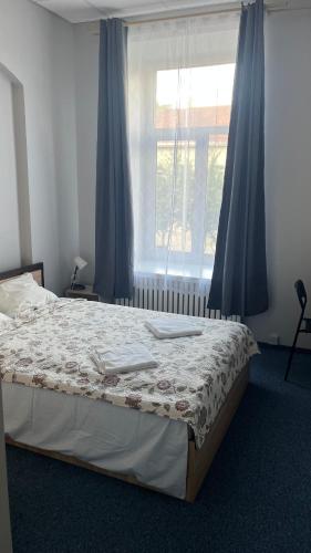 Postel nebo postele na pokoji v ubytování Vilnius centre house