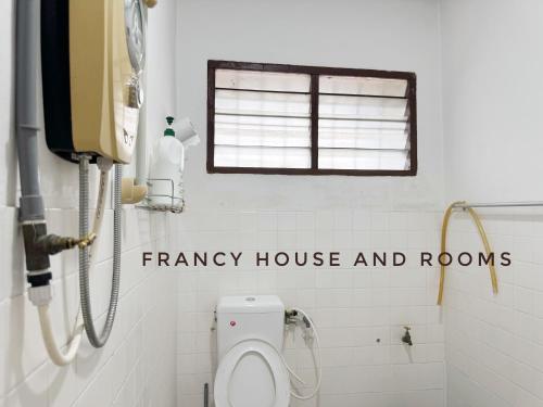 a bathroom with aryan house and rooms written on the wall at Nanyang Style Home In Ipoh in Ipoh