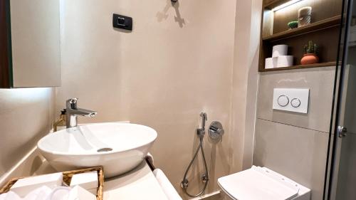 Ένα μπάνιο στο Apart hotel Emiia