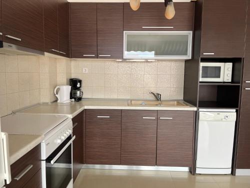 Dapur atau dapur kecil di Nostro apartment Flogita