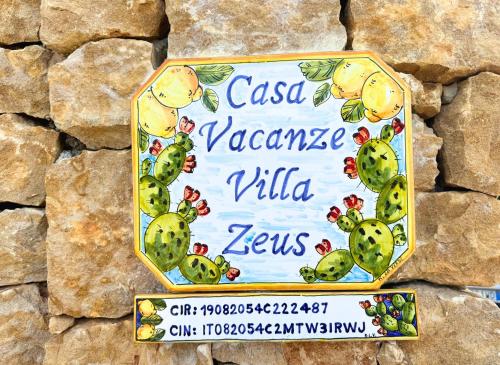 Сертификат, награда, вывеска или другой документ, выставленный в Case Vacanza Zeus
