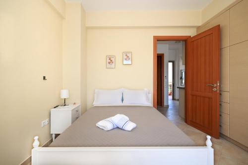 Ένα ή περισσότερα κρεβάτια σε δωμάτιο στο Captataki