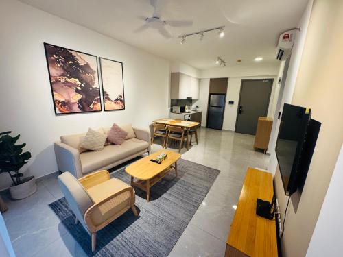 a living room with a couch and a table at Agile TRX Luxury suite Bukit bintang in Kuala Lumpur