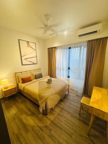 a bedroom with a bed and a large window at Agile TRX Luxury suite Bukit bintang in Kuala Lumpur