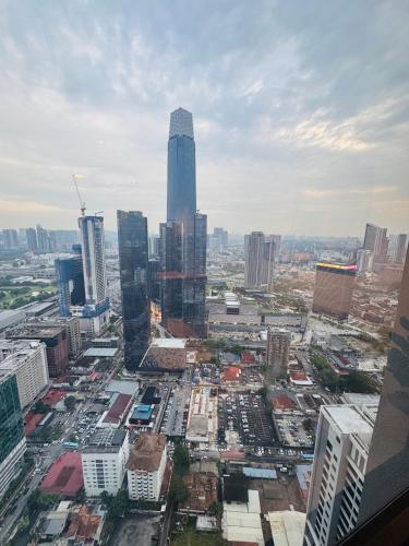 an aerial view of a city with tall buildings at Agile TRX Luxury suite Bukit bintang in Kuala Lumpur